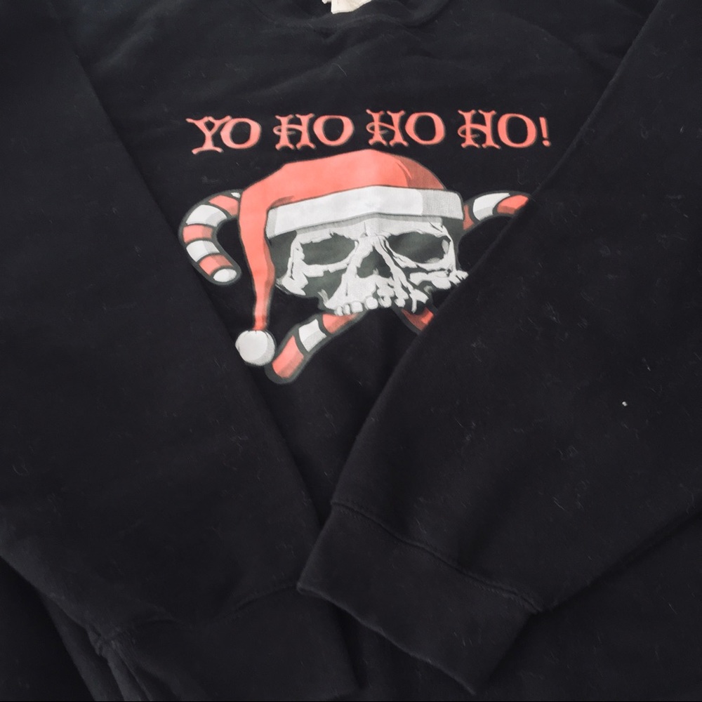 Skull and canes merry Christmas skull sweatshirt.